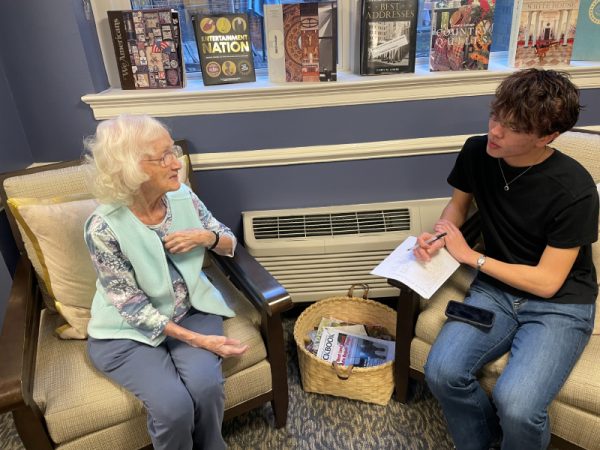 Ana Steele Clark talking to student Charlie Martin at Chevy Chase House in Northwest Washington DC, March 2025