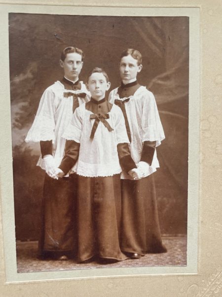 Bob Norris' father as an alter boy in the early 1900s, far right: Leo Brison Norris. Photo displayed in the Knollwood apartment of Bob Norris