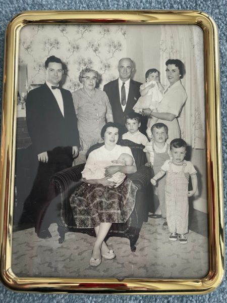 The growing family of Elaine O'Malley -- a photo in her apartment at Knollwood in January 2025